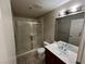 Bathroom featuring a glass enclosed shower and single vanity at 8255 Las Vegas Blvd # 711, Las Vegas, NV 89123