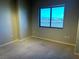 Bright bedroom featuring large window with a beautiful view at 8255 Las Vegas Blvd # 711, Las Vegas, NV 89123