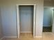 Bedroom closet with bi-fold doors and wire shelving, offering ample storage at 8255 Las Vegas Blvd # 711, Las Vegas, NV 89123
