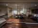 Modern conference room behind glass doors with comfortable seating and a large table at 8255 Las Vegas Blvd # 711, Las Vegas, NV 89123
