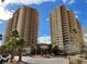 Beautiful high-rise condo complex featuring well-manicured landscaping at 8255 Las Vegas Blvd # 711, Las Vegas, NV 89123