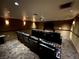 Private theater room with comfortable seating and a large projection screen at 8255 Las Vegas Blvd # 711, Las Vegas, NV 89123