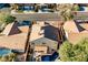 Backyard view of home featuring a private swimming pool and shaded patio perfect for outdoor relaxation and entertainment at 841 Glitter Glen Ct, Las Vegas, NV 89123