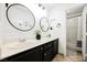 Elegant bathroom featuring dual sinks, modern fixtures, and a shower-tub combo, designed for comfort and style at 841 Glitter Glen Ct, Las Vegas, NV 89123