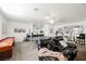 Spacious game room featuring a bar area, ping pong table, and comfortable seating at 841 Glitter Glen Ct, Las Vegas, NV 89123
