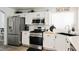 Bright kitchen featuring stainless steel appliances and ample countertop space at 841 Glitter Glen Ct, Las Vegas, NV 89123