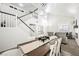 Open-concept living room with dining area and staircase at 841 Glitter Glen Ct, Las Vegas, NV 89123