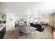 Spacious living room featuring a ping pong table, bar area, comfortable seating, and neutral tones, perfect for relaxation and fun at 841 Glitter Glen Ct, Las Vegas, NV 89123