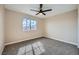 Bedroom featuring carpeted floors, ceiling fan and one window at 9272 W Viking Rd, Las Vegas, NV 89147