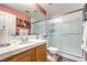 Bathroom with a large mirror, frosted glass shower, and a single sink vanity at 9378 Chateau St Jean Dr, Las Vegas, NV 89123