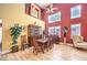 Inviting dining area with warm colors, hardwood floors, and plenty of natural light at 9378 Chateau St Jean Dr, Las Vegas, NV 89123