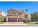 Charming two-story home with a three-car garage and well-maintained landscaping at 9378 Chateau St Jean Dr, Las Vegas, NV 89123