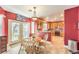 Eat in kitchen featuring tile floors, stainless appliances, and backyard access at 9378 Chateau St Jean Dr, Las Vegas, NV 89123