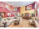 Spacious living room featuring soaring ceilings, an open floor plan, and hardwood floors at 9378 Chateau St Jean Dr, Las Vegas, NV 89123