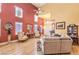 Bright living room with soaring ceilings, abundant natural light, and hardwood floors at 9378 Chateau St Jean Dr, Las Vegas, NV 89123