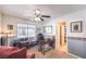 Inviting home office featuring a ceiling fan, natural light, and charming decor at 9378 Chateau St Jean Dr, Las Vegas, NV 89123