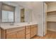 Bright bathroom features a double sink vanity and walk-in closet, offering convenience and ample storage at 97 Sarabeth St, Las Vegas, NV 89138