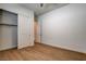 Bedroom with wood floors and a closet and a window, providing a comfortable living space at 97 Sarabeth St, Las Vegas, NV 89138