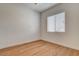 Bedroom with wood floors and a window, offering a peaceful and inviting living space at 97 Sarabeth St, Las Vegas, NV 89138