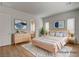 Staged bedroom with modern decor, rug, and natural light at 97 Sarabeth St, Las Vegas, NV 89138
