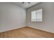 Inviting bedroom with wood floors and a window offering natural light and comfortable living space at 97 Sarabeth St, Las Vegas, NV 89138