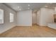 Spacious living area flowing into a kitchen area with light wood flooring at 97 Sarabeth St, Las Vegas, NV 89138