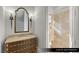Casita bathroom boasting a marble vanity and a glass-enclosed shower, providing a luxurious experience at 9940 Orient Express Ct, Las Vegas, NV 89145
