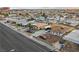 Aerial view of a residential property with a well-maintained front yard and ample parking at 1100 H St, Las Vegas, NV 89106