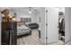 Bedroom with wood floors, a ceiling fan, a large window and closet at 1100 H St, Las Vegas, NV 89106