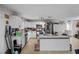 Bright kitchen with white cabinets, stainless steel appliances, and a spacious marble island at 1100 H St, Las Vegas, NV 89106