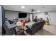 Cozy living room featuring tile flooring and a ceiling fan at 1100 H St, Las Vegas, NV 89106
