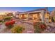 Scenic backyard showcasing desert landscaping, mature plants, and outdoor entertaining areas at 1809 Prichard Ave, Henderson, NV 89052