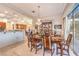 Open dining space with stylish chandelier and easy access to the kitchen and outdoor area at 1809 Prichard Ave, Henderson, NV 89052