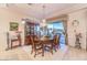 Charming dining room with backyard views, classic furniture, and beautiful natural light at 1809 Prichard Ave, Henderson, NV 89052
