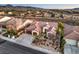 Beautiful single-story home features a terracotta roof, a three-car garage, desert landscaping, and tranquil neighborhood views at 1809 Prichard Ave, Henderson, NV 89052