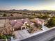 Stunning single-story home featuring a terracotta roof, three-car garage, desert landscaping, and a tranquil neighborhood view at 1809 Prichard Ave, Henderson, NV 89052