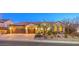 Charming single-story home featuring a three-car garage and beautiful desert landscaping at 1809 Prichard Ave, Henderson, NV 89052