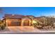 Lovely single-story home featuring a two-car garage and beautifully xeriscaped front yard at 1809 Prichard Ave, Henderson, NV 89052