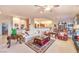 Living room featuring a fireplace, open concept living, and built in display shelving at 1809 Prichard Ave, Henderson, NV 89052