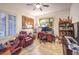 Comfortable office space featuring shutters, tile flooring, and a ceiling fan at 1809 Prichard Ave, Henderson, NV 89052