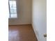 Bedroom with tiled floor and window with blinds at 2060 Rancho Lake Dr # 202, Las Vegas, NV 89108