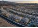An elevated view showcases the beautiful community of stylish homes, pools and desert landscaping at 2171 King Crest Ct, Henderson, NV 89052