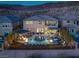 Amazing backyard oasis with pool, spa, fire pit, and outdoor seating for entertaining at 2171 King Crest Ct, Henderson, NV 89052
