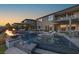 Luxury backyard oasis features a pool, spa, fire features, outdoor seating, and lush landscaping at 2171 King Crest Ct, Henderson, NV 89052