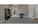 Bedroom featuring neutral colors, carpet, and an ensuite bathroom at 2171 King Crest Ct, Henderson, NV 89052