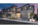 Charming modern two-story home boasting a well-manicured yard and an attached two-car garage at 2171 King Crest Ct, Henderson, NV 89052