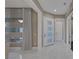Bright and airy foyer featuring marble floors, contemporary lighting, and modern door at 2171 King Crest Ct, Henderson, NV 89052