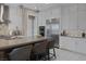 Spacious kitchen featuring modern stainless steel appliances, stylish backsplash, and ample storage at 2171 King Crest Ct, Henderson, NV 89052