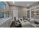 Bright home office with clerestory window, custom millwork and access to the dining and living areas at 2171 King Crest Ct, Henderson, NV 89052