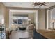 A sitting area with a view from the large windows within the main bedroom at 2171 King Crest Ct, Henderson, NV 89052